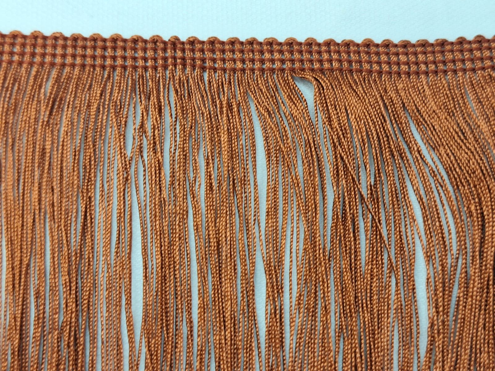 WhatsApp Image 2025 10 16 at 09.30.52 Fleco de seda teja