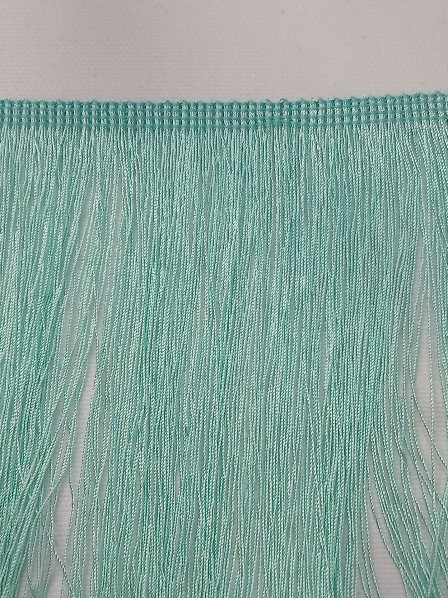 WhatsApp Image 2026 02 12 at 16.40.31 Fleco de seda menta